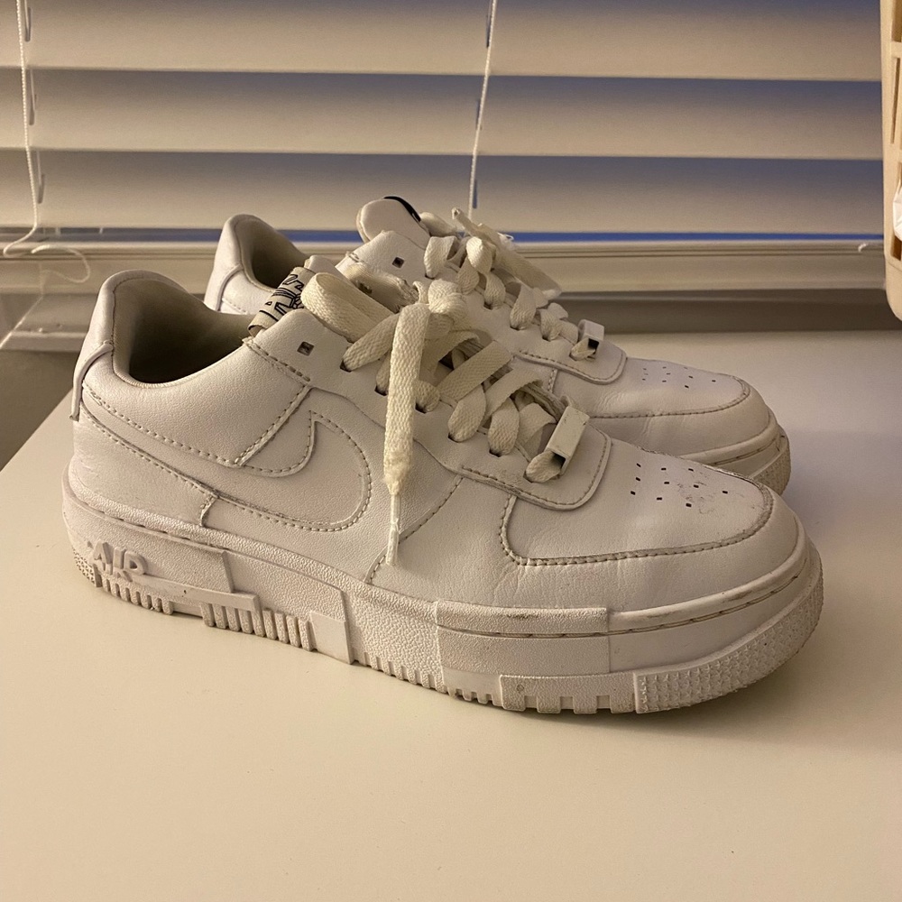 Women’s white Nike Air Force 1 Pixel sneakers